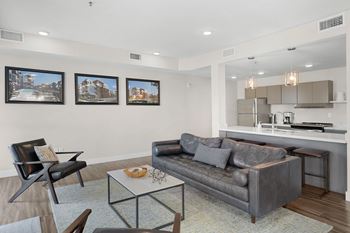 Clubhouse with lounge area, fireplace, tv, games, and kitchen